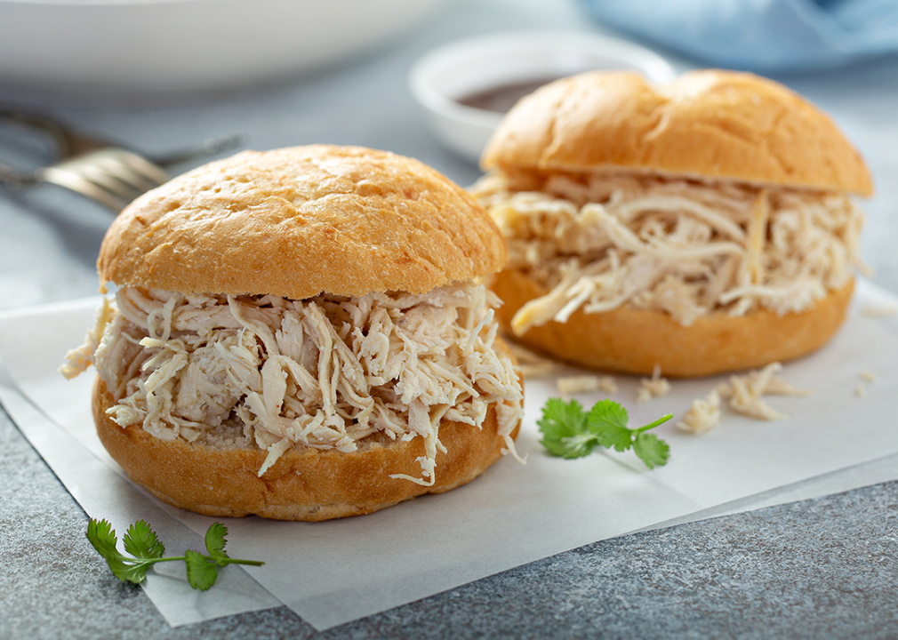 Pulled chicken sandwiches on roll.