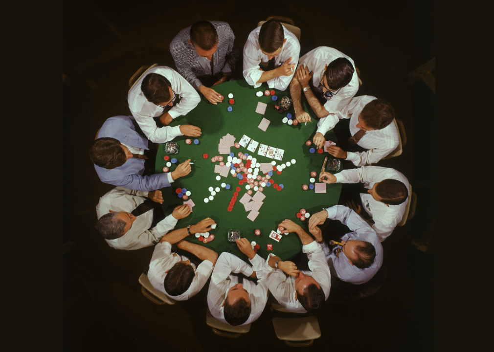 Overhead view of men playing Texas Hold ‘Em in 1968.