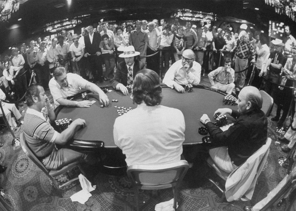 Sidney Wyman, Crandell Addington, and Johnny Moss participate in the World Poker Championship at the Horseshoe Casino in 1974.