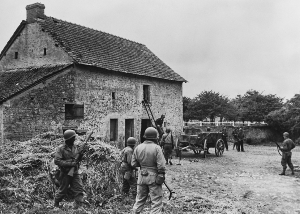 A platoon of African American soldiers from the 320th Barrage Balloon Battalion of V Corps, United States First Army led by Captain Samuel Broussard.