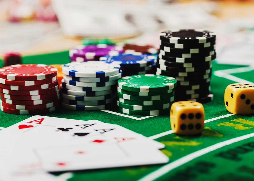 Cards and chips on poker table.