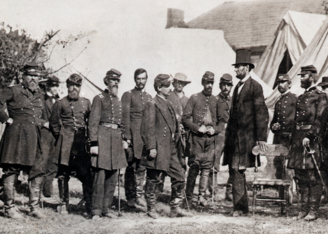 President Lincoln visits General George B. McClellan at camp.