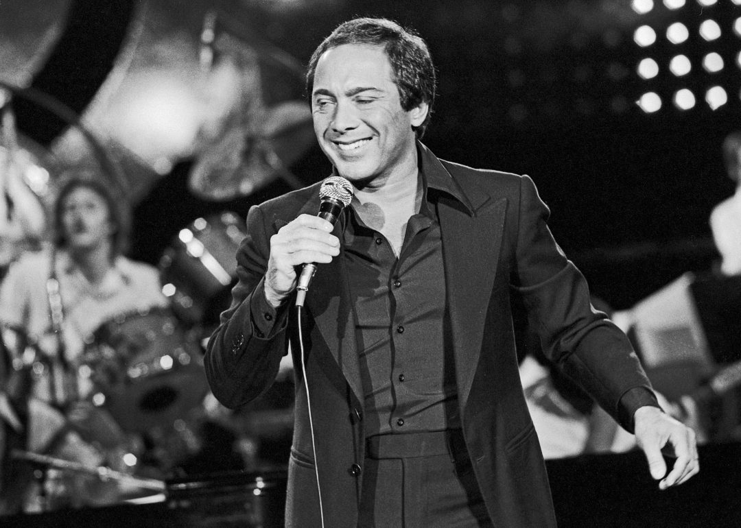 Paul Anka performing on stage.