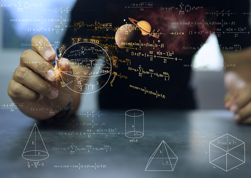 Person working on complex equations.