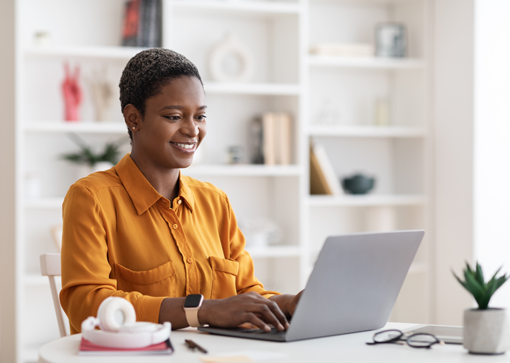 Woman working at home office.