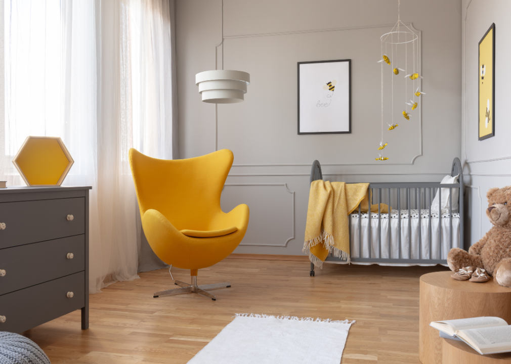 Yellow Arne Jacobsen Egg chair in nursery.
