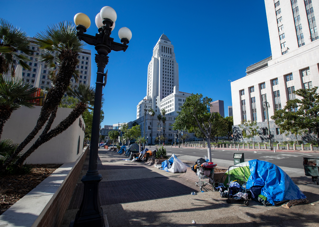 Homeless tents lining the sidewalk along downtown Los Angeles Street
