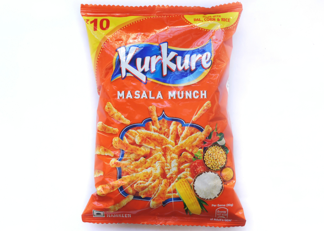 Bag of Kurkure Masala Munch on white background.