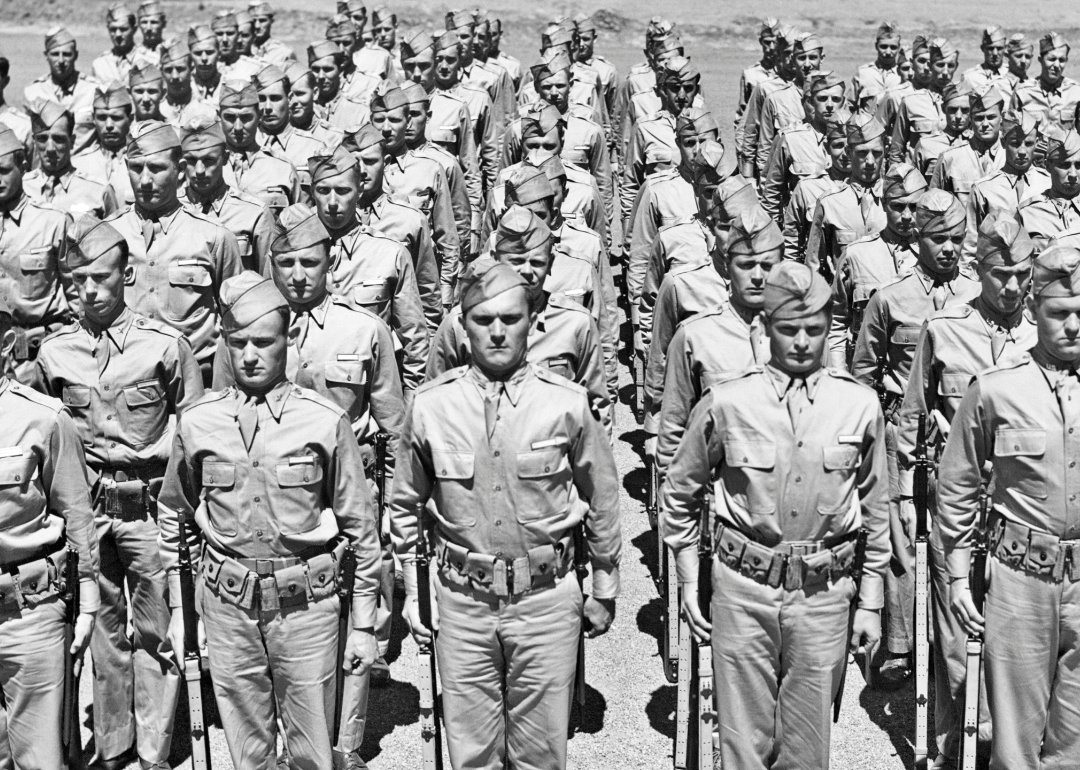 Rows of American Soldiers standing at attention.
