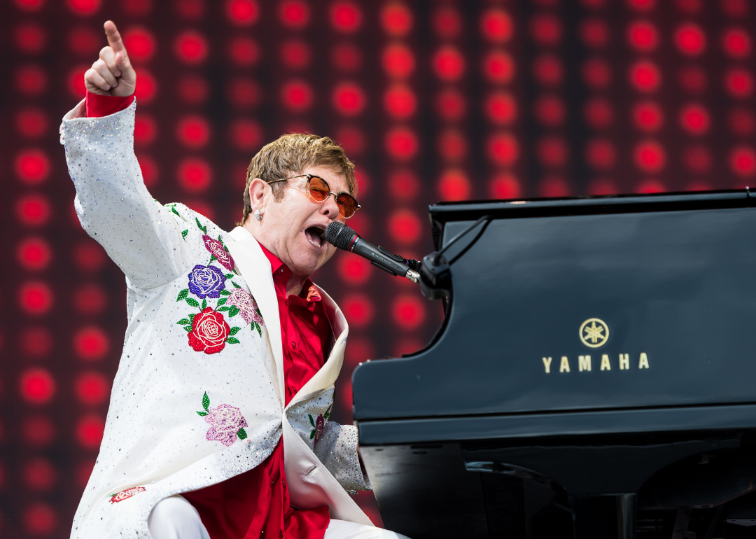 Elton John performs onstage.