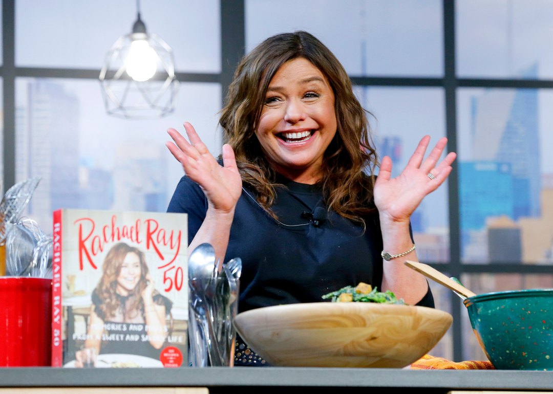 Rachael Ray on stage during a culinary demonstration.