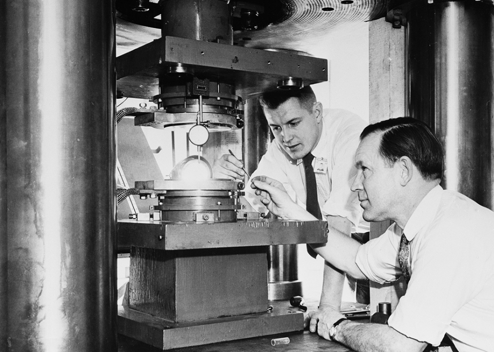 Scientists at the General Electric Research Laboratory using a device to make diamonds.