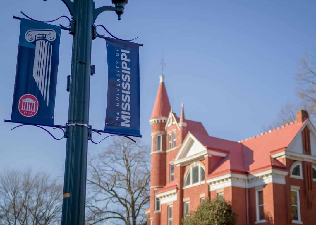 University of Mississippi banner in front of campus building