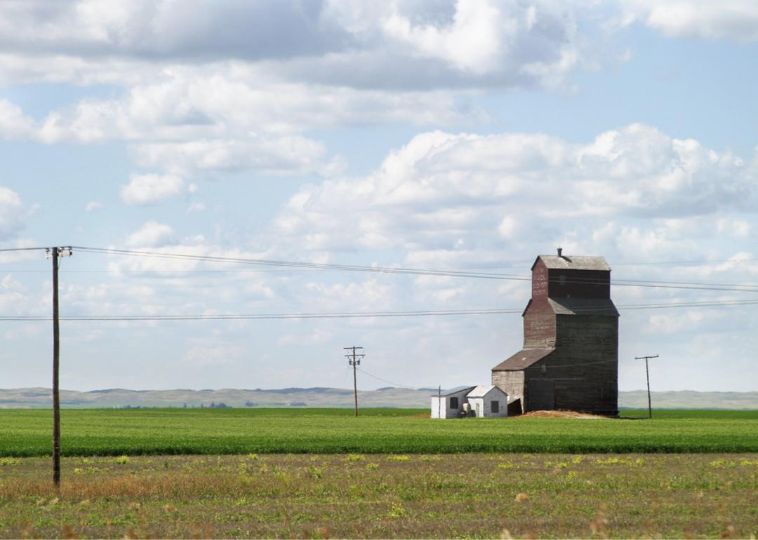 Prairie landscape with grain elevator.