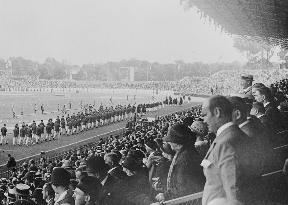 Spectators watch the Parade of Nations during the opening ceremony.
