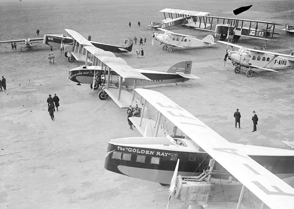 Passenger aircraft line on the runway at Le Bourget Airport.