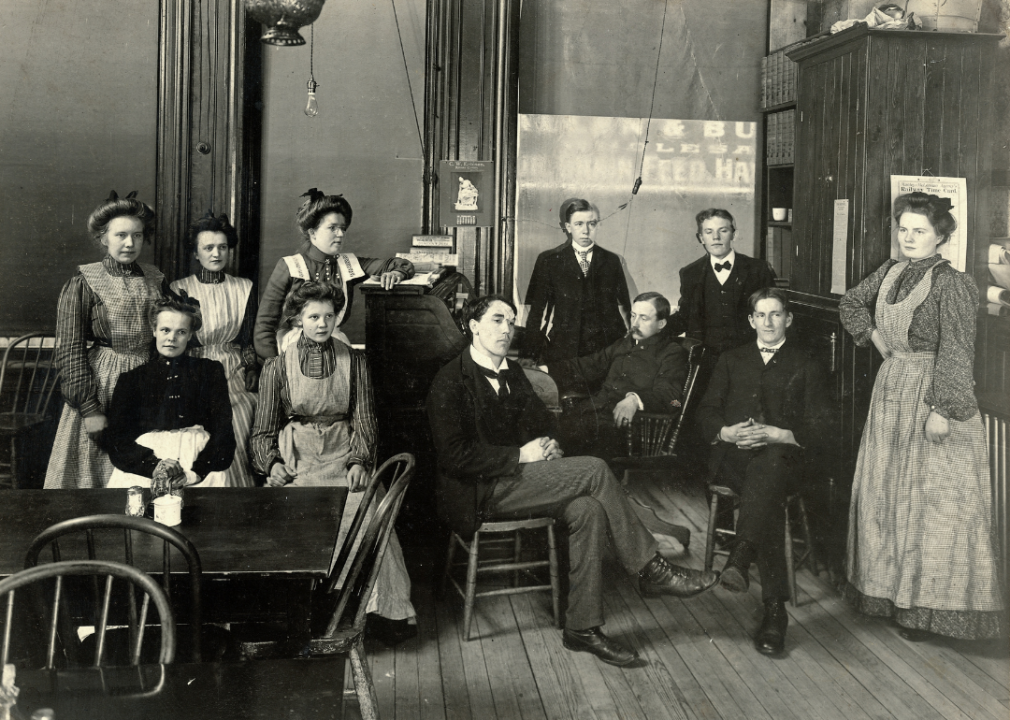 Waiters and waitresses pose for a group picture