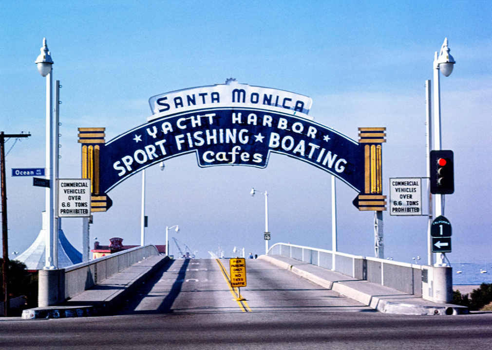 Santa Monica Pier sign on clear day.