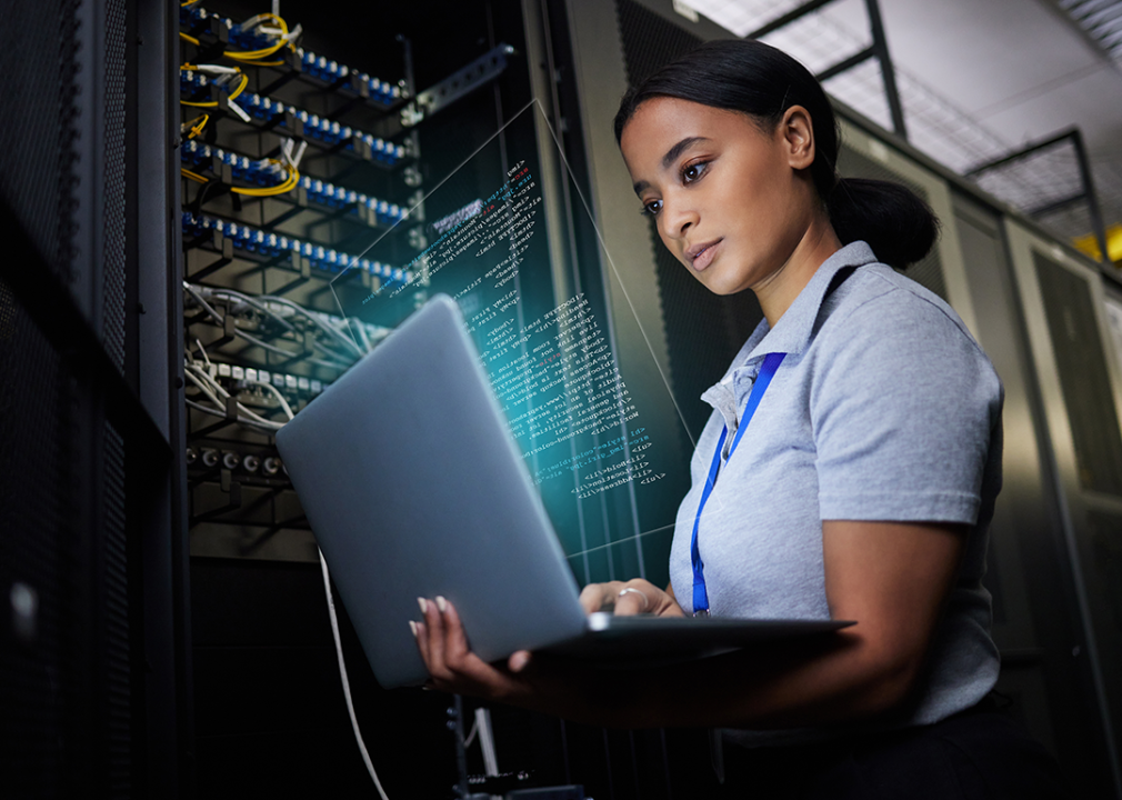 Engineer working in a server room.