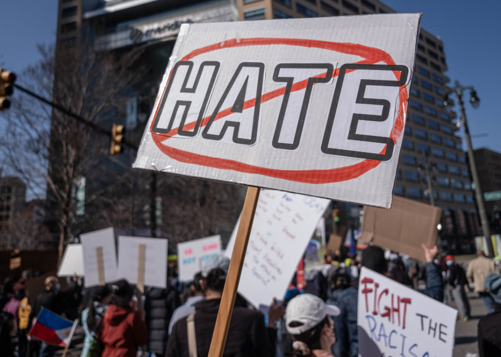 A ‘Stop Hate’ sign is held at a rally in Detroit