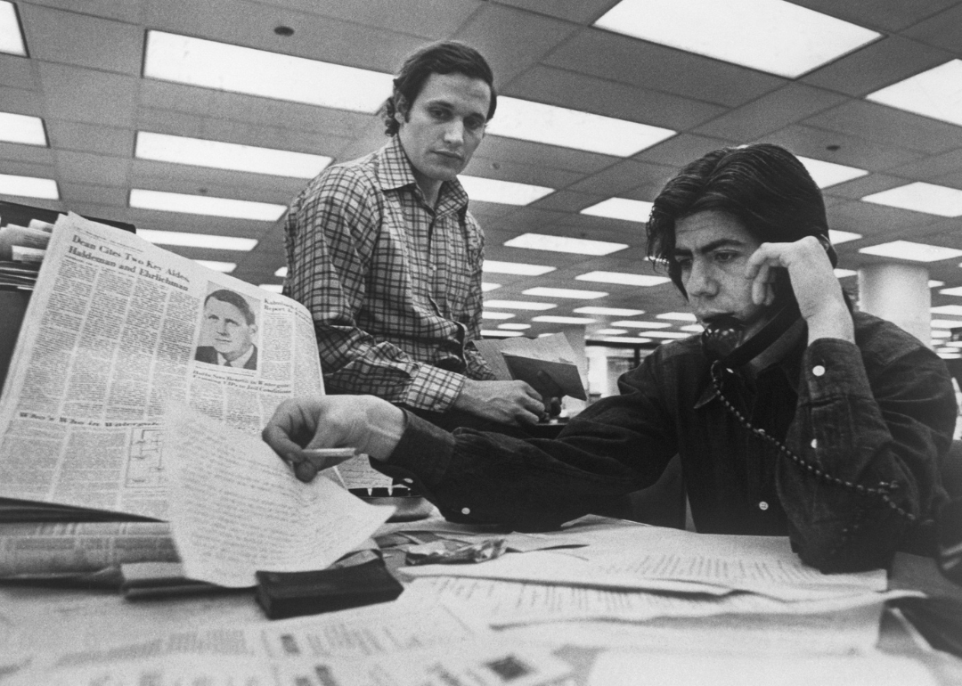 Bob Woodward and Carl Bernstein at their Washington Post desk.