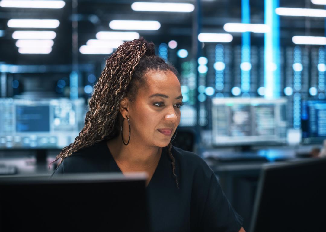 Cybersecurity professional working in data center.