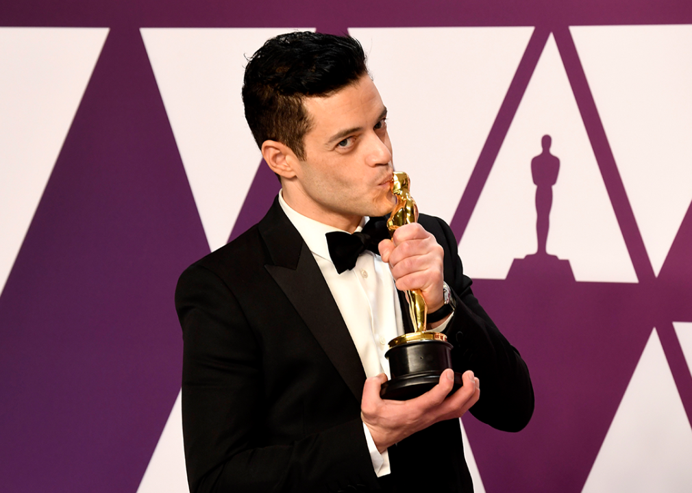 Rami Malek poses with Best Actor Award.
