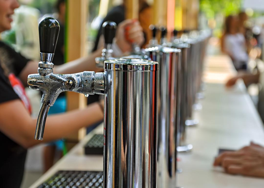 Beer taps at an outdoor festival.