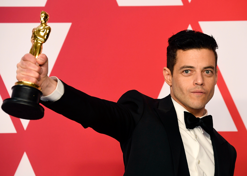 Rami Malek poses with Best Actor Award.