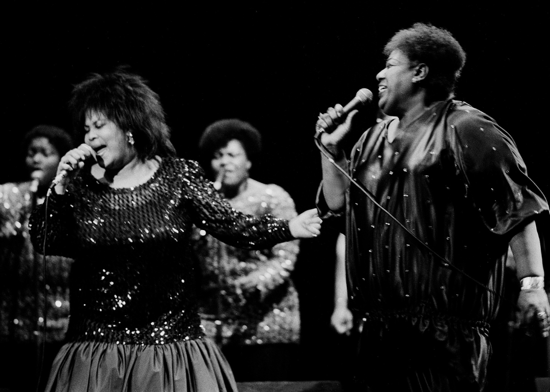 Izora Armstead and Martha Wash of The Weather Girls perform onstage.
