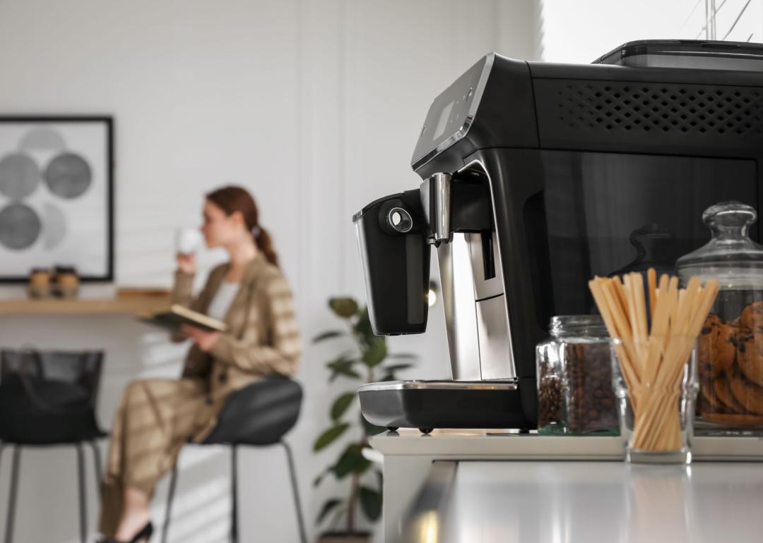 Coffee machine setup in office break room.
