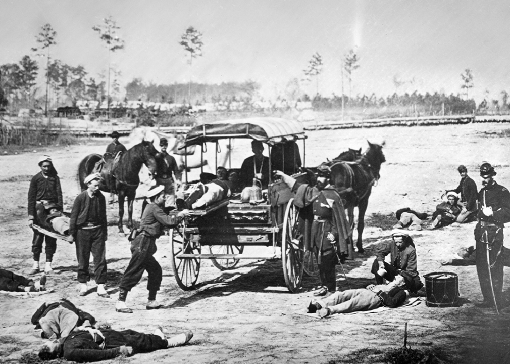 Members of the Fifth Regiment New York Volunteers conduct an ambulance drill.