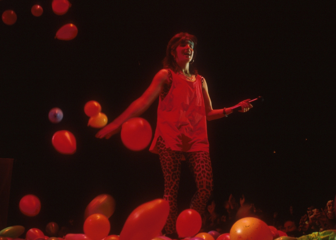 Nena performing in concert with balloons.