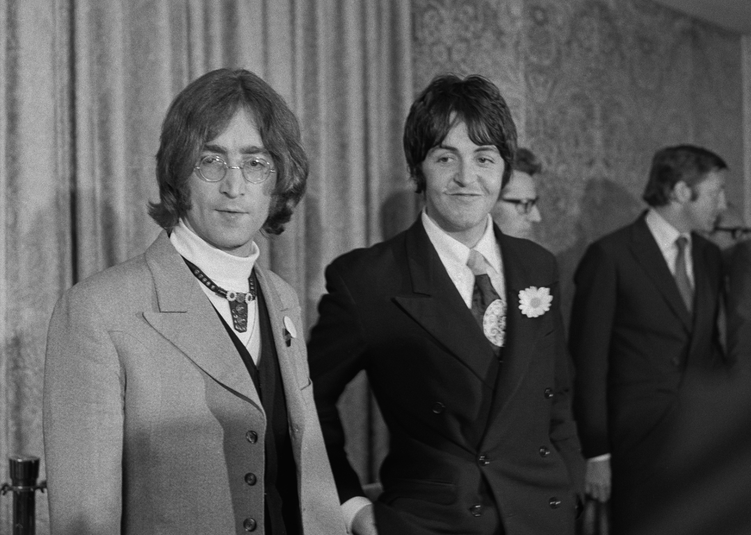 John Lennon and Paul McCartney hold a press conference.