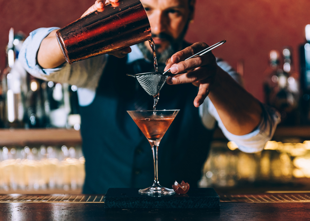 Bartender mixing drink