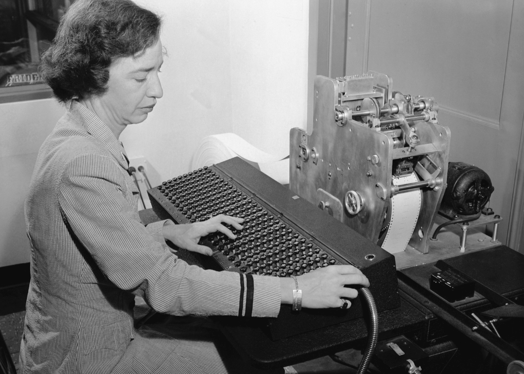 Grace Hopper using early computer.
