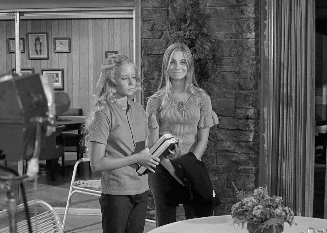 Eve Plumb and Maureen McCormick rehearse on the set of 