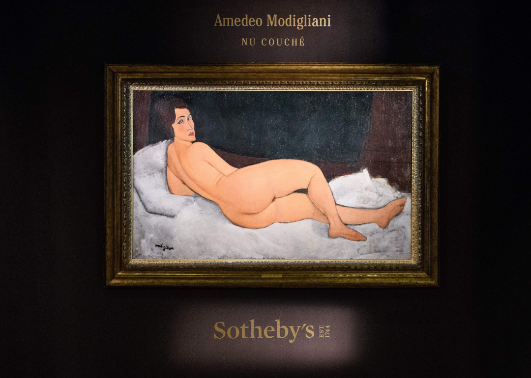 Modigliani's Nu couché (sur le côté gauche) on display at Sotheby’s.