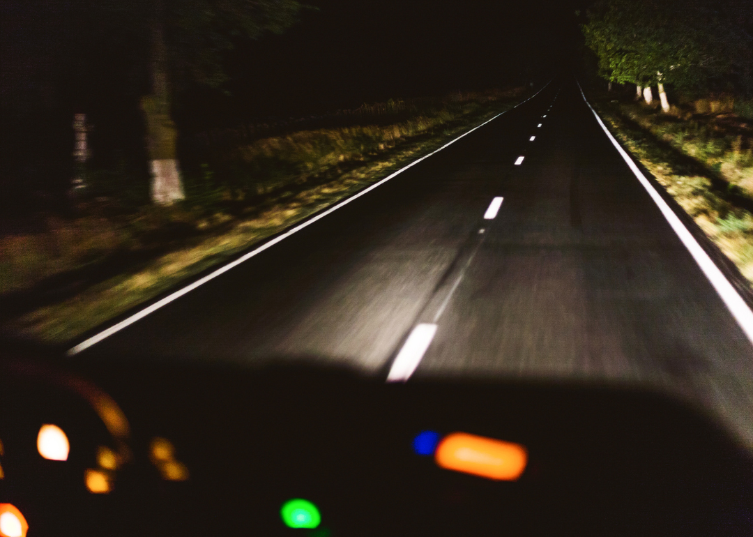 Night driving view from inside vehicle.