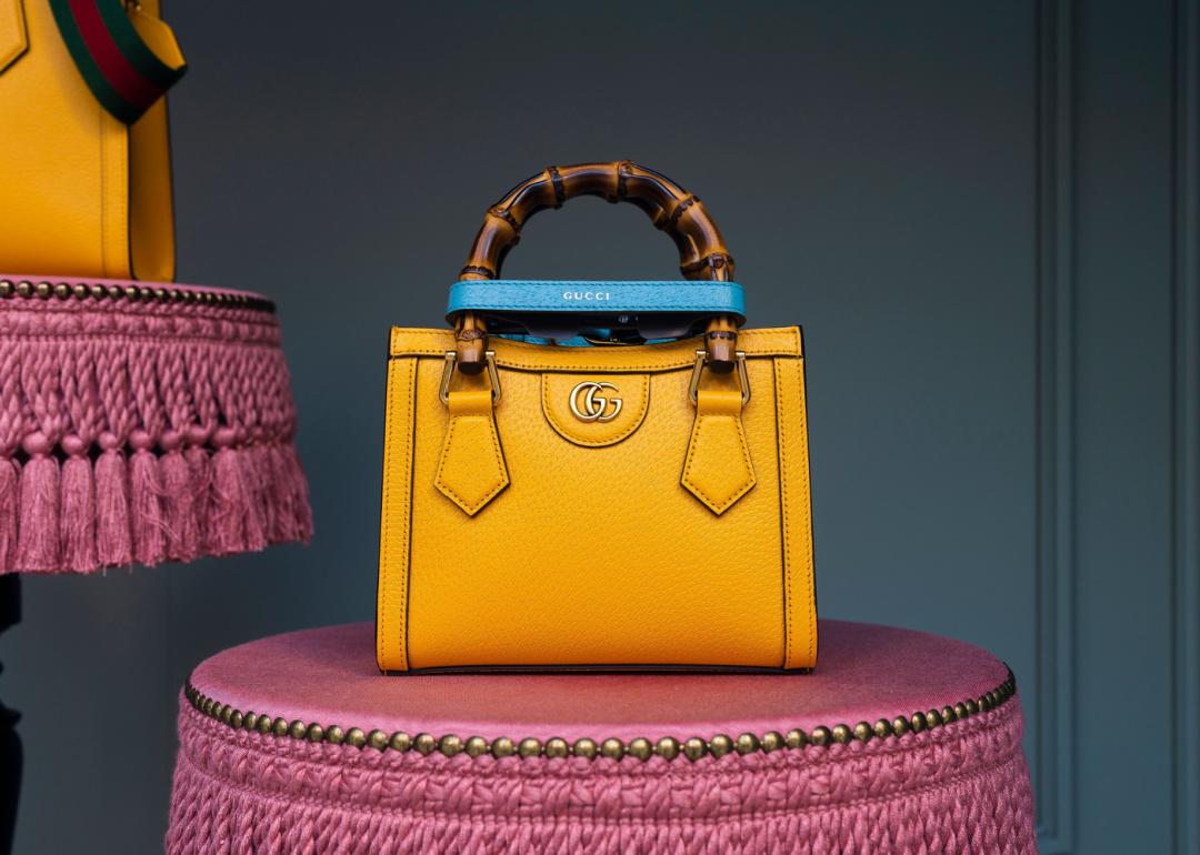 Leather Gucci brand handbag on display.