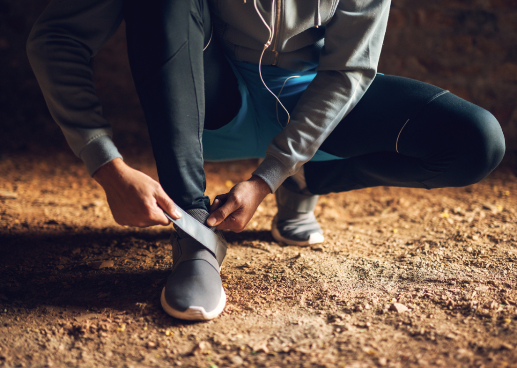 Person putting on velcro sneakers