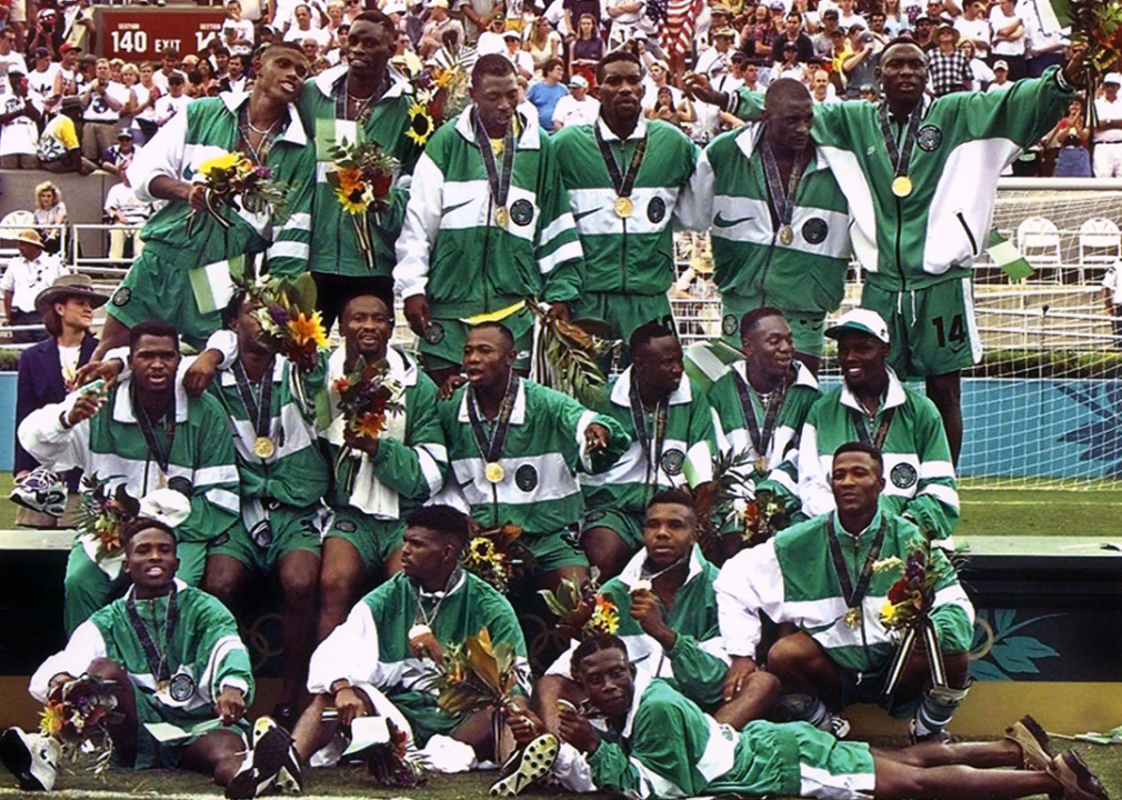 Nigeria's soccer team posing for photographers after receiving their gold medals.