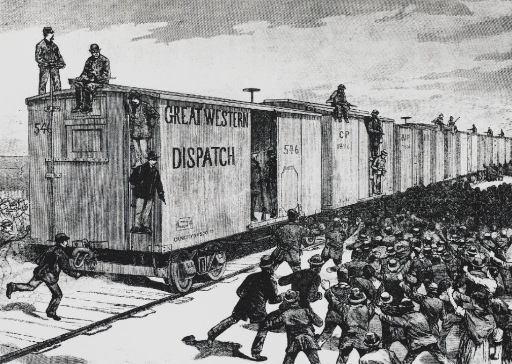 Illustration of police protecting train during railway strike