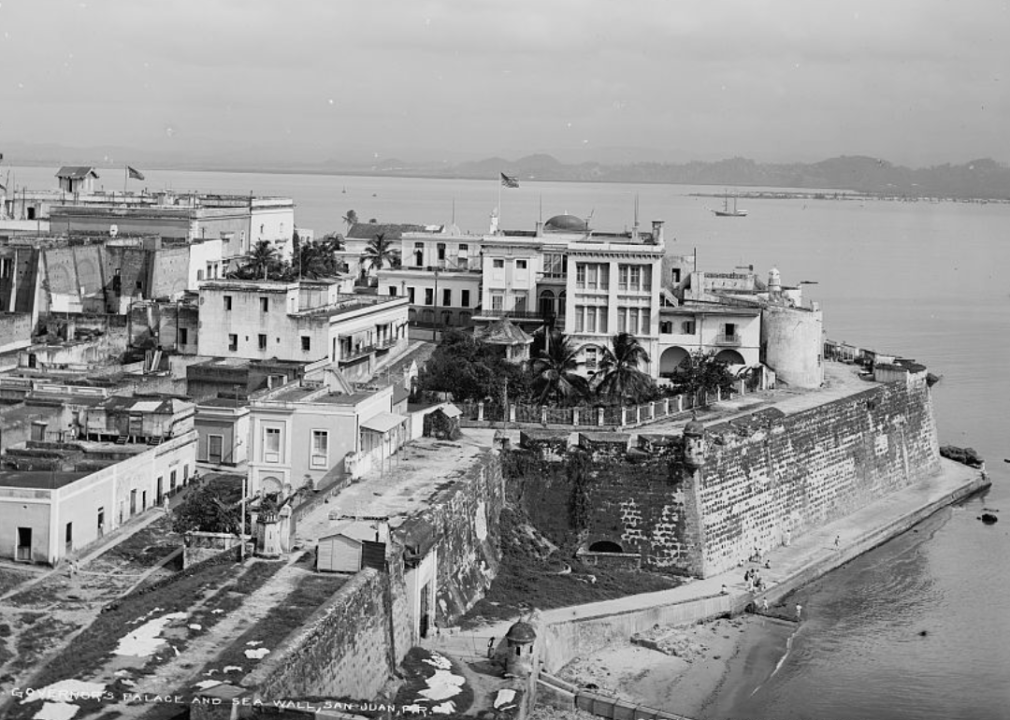 Governor's Palace with American Flag and sea wall in San Juan