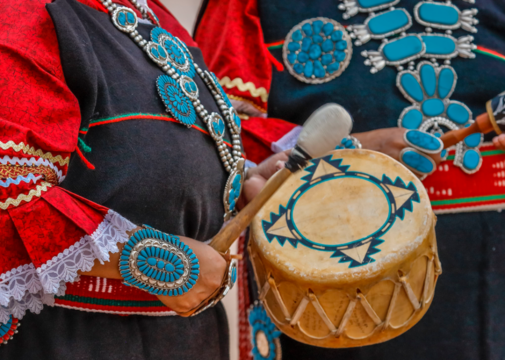 A Zuni Native American plays a drum in a ceremony in Gallup, New Mexico.