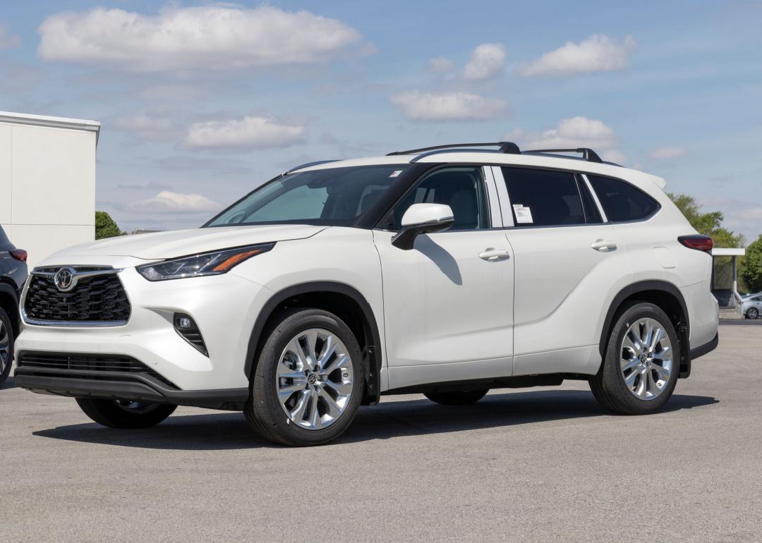 White Toyota Highlander parked at dealership