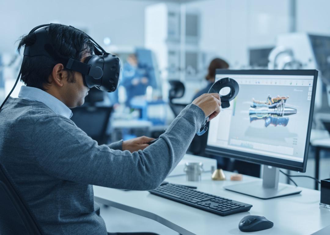 Mechanical engineer wearing virtual reality headset
