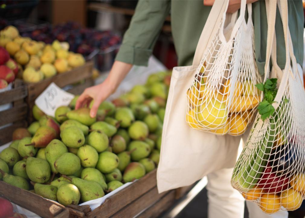 Shopping with reusable bag at farmers market