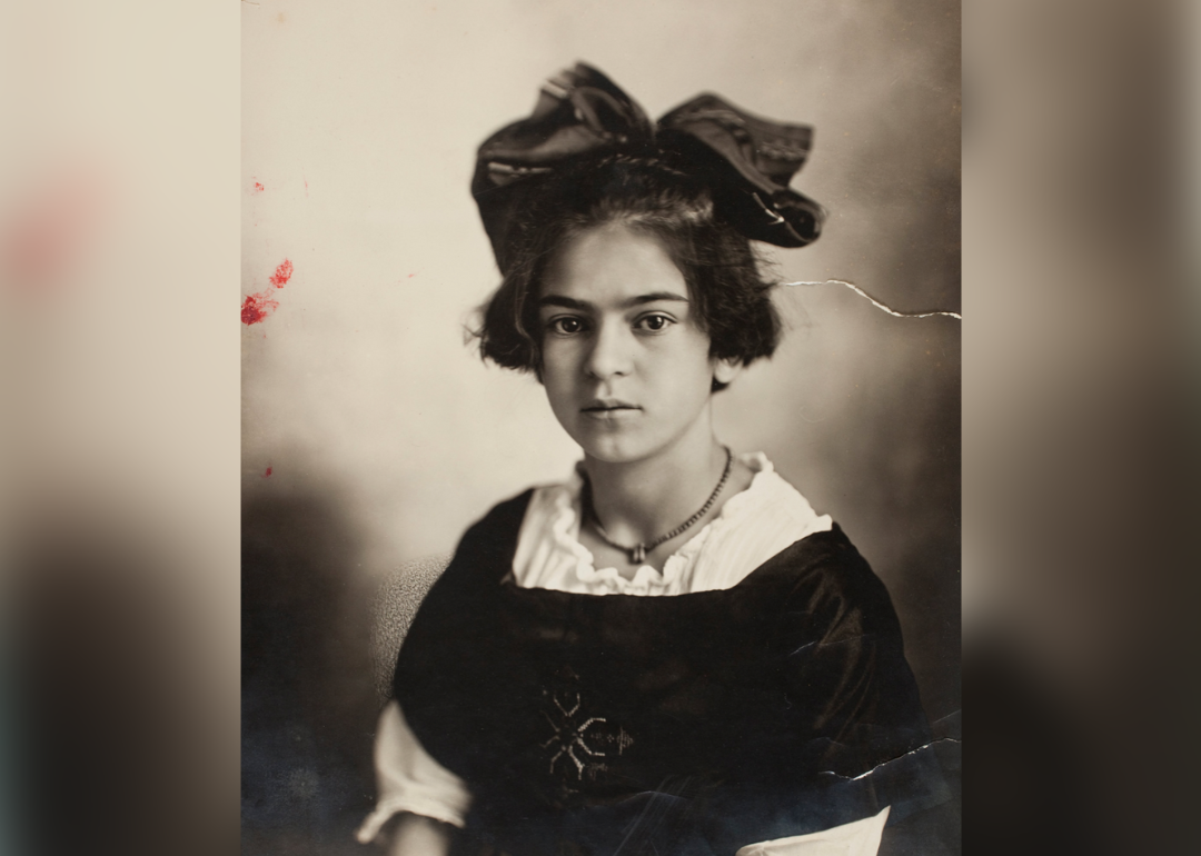 A portrait of a young Frida Kahlo.