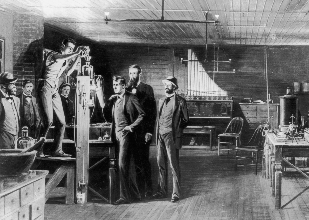 Illustration of Edison in a scene at Menlo Park laboratory.
